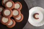 Load image into Gallery viewer, 2 Dozen Chocolate Thumbprints with Vanilla Icing
